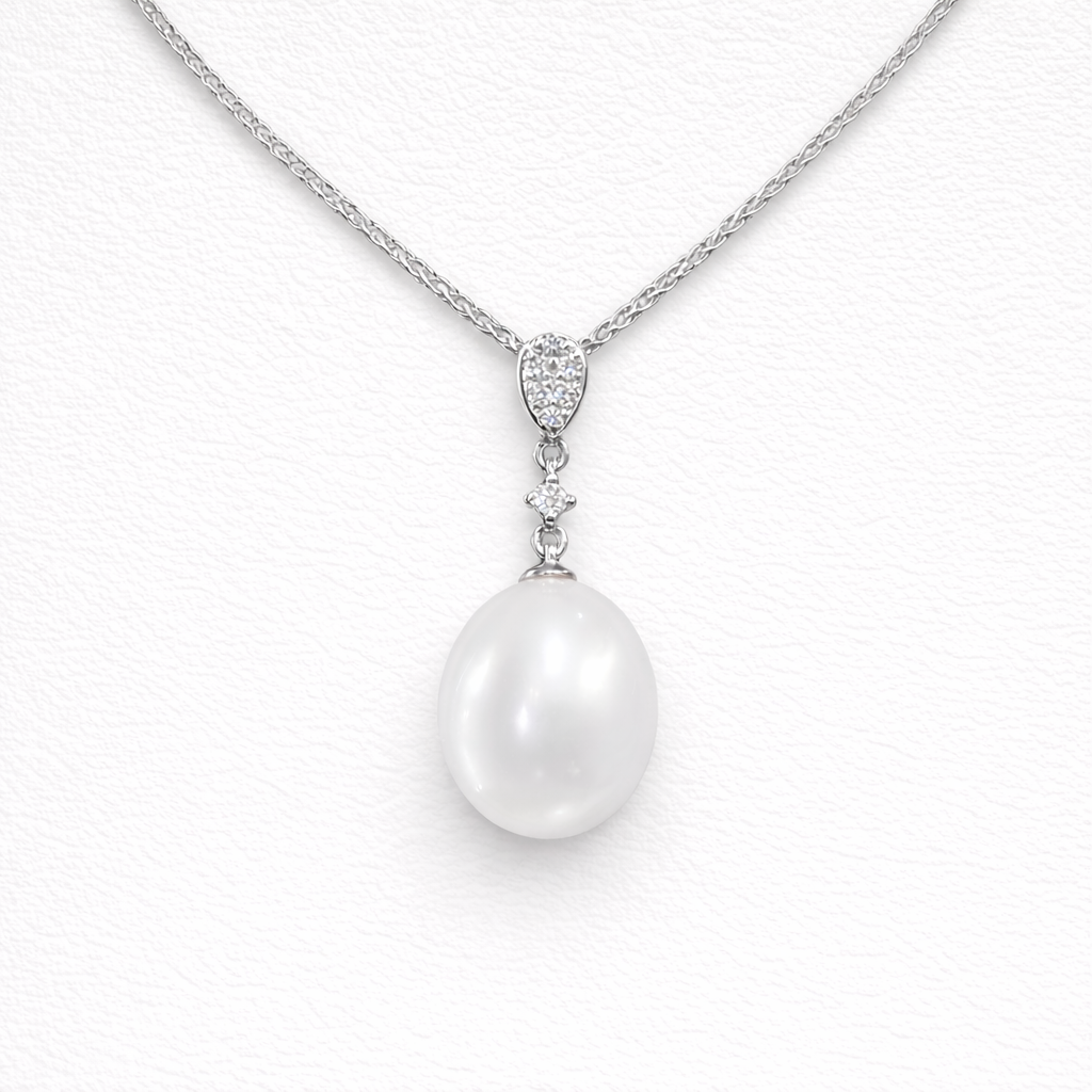 White Freshwater Cultured Pearl and Natural Diamond Pendant In 18ct White Gold