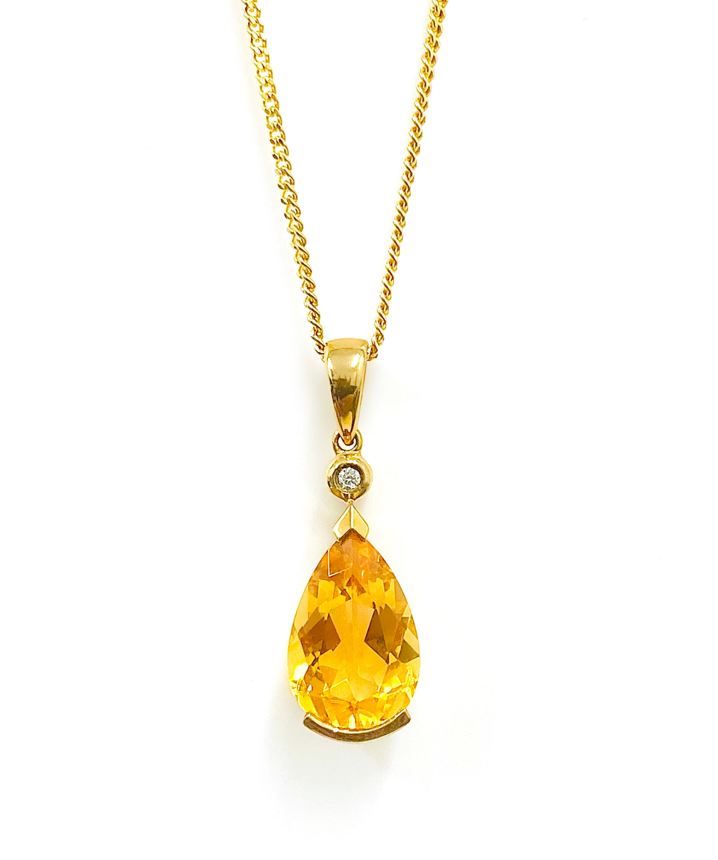 Pear Cut Citrine and Diamond Pendant in 9 Carat Yellow Gold