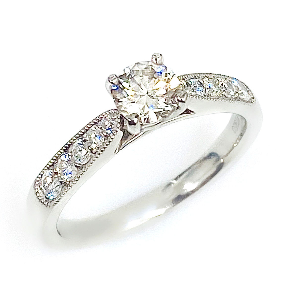 Platinum 0.50ct Diamond Solitaire with Diamond Set Shoulders & Beaded Edge