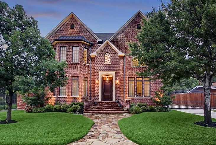 beautiful brick tudor style custom home