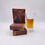 Thumbnail: Kentucky Bourbon bar soap product image, shot of bourbon next to a stack of soap