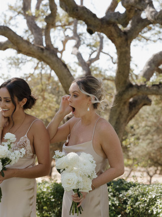 Bridesmaid reaction during first look at Villa San Juliette Wedding by Paso Robles Photographer Mackenzie Rana