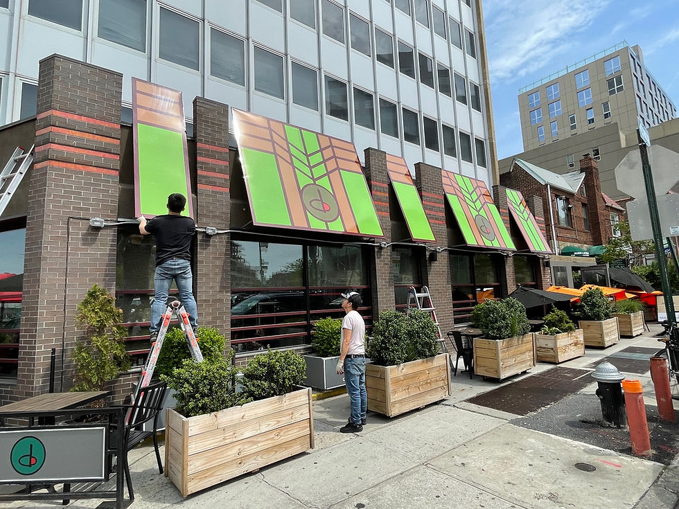 Installing custom business signs on a storefront