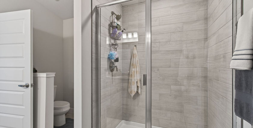 Bathroom with a modern glass shower and toilet