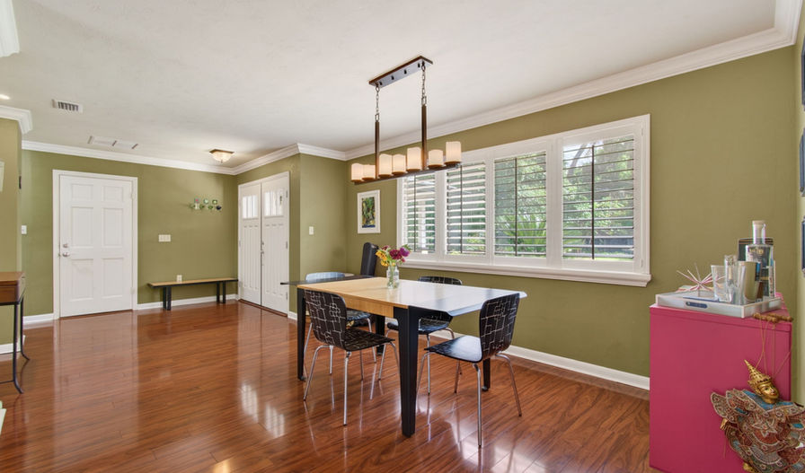 Dining room in a Monterey home with wood floors