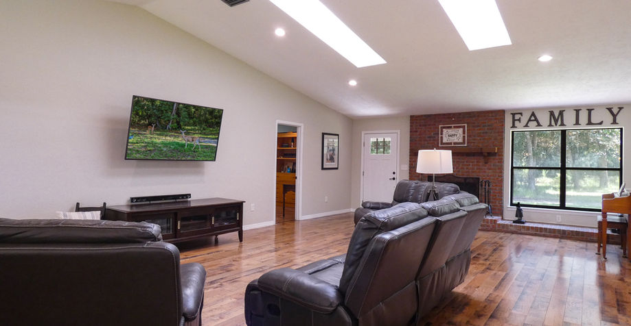 Living room with recliner, tv and