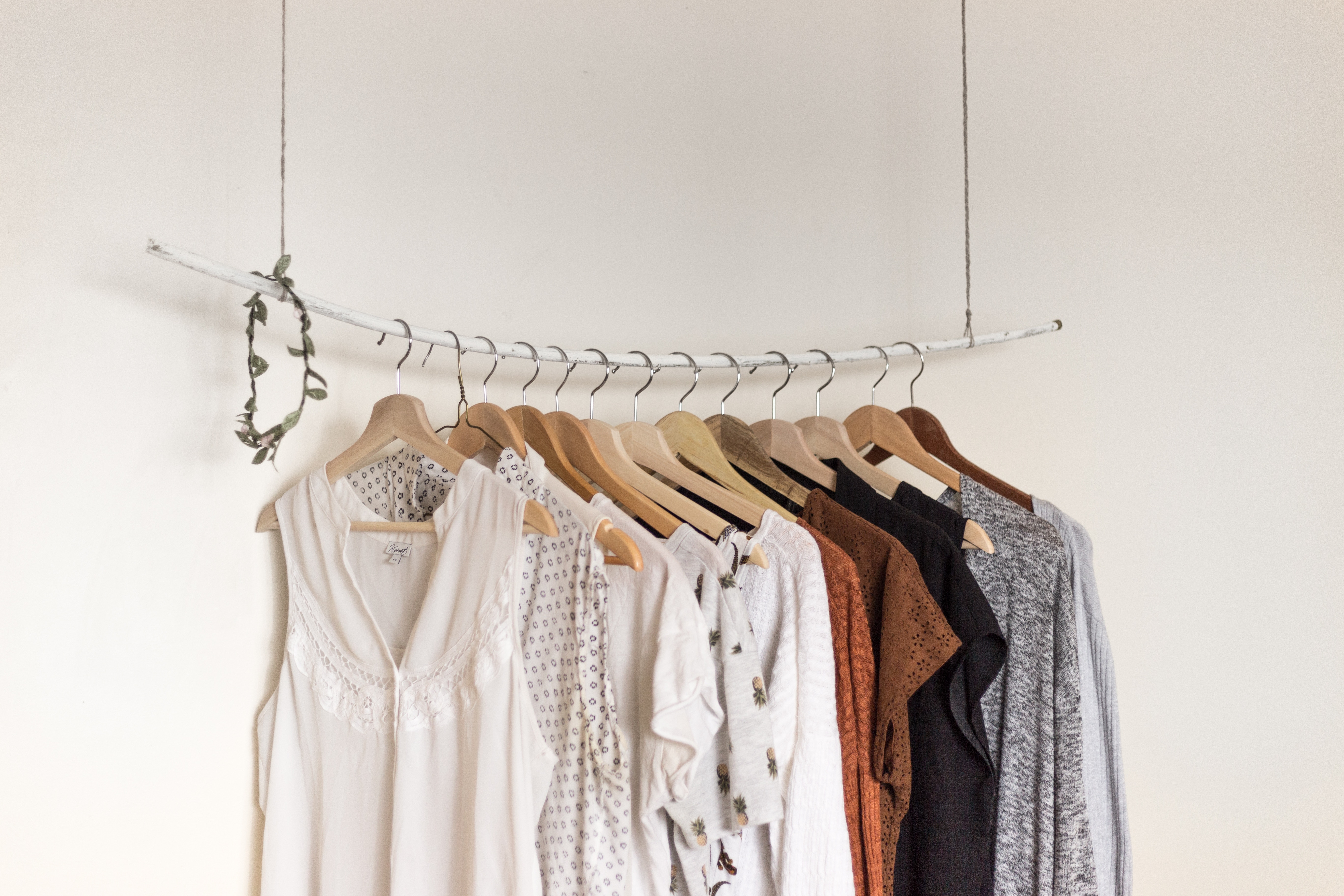 Minimalist clothing rail with cloths. 