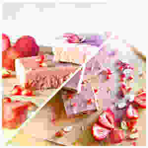 Pomegranate seeds intertwined with juicy strawberries in a swirl of delicately flavored almonds