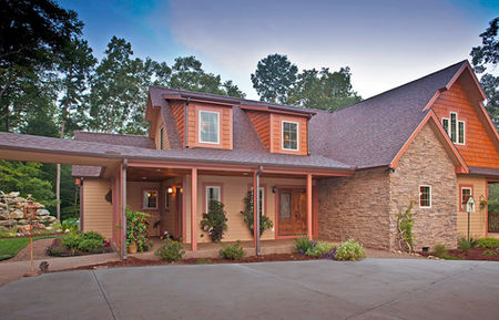 The Grand Teton modular home, exterior, covered porch at dusk