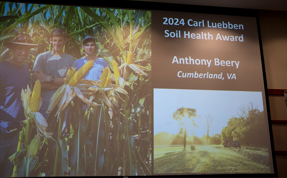 A slide with two photos of a farm from the award presentation.