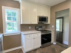 Kitchen cabinetry reflects the original