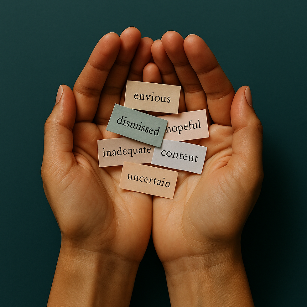 Hands hold colorful emotion cards: envious, dismissed, hopeful, inadequate, content, uncertain. Dark green background conveys introspection.