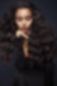 Beautiful young woman with long wavy hai