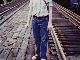 Teenager On A Train Trestle Bridge