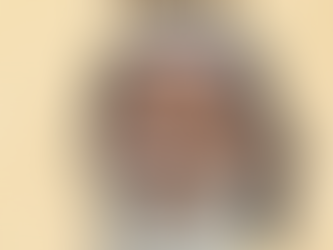 A commemorative image of Shibu Soren, featuring a close-up of him smiling warmly with his signature long white beard and hair. The background is a soft beige, with the text "Remembering Shibu Soren 1944–2024" and the quote "...he gave a voice to the voiceless…" written below.