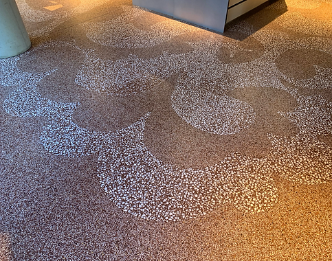 Taken slightly from the left, shows a decorative and inspiring floor - red hues playing together.