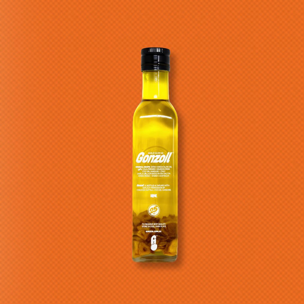 Gonzoil Garlic Infused Olive Oil in a glass bottle with white print, against an orange background