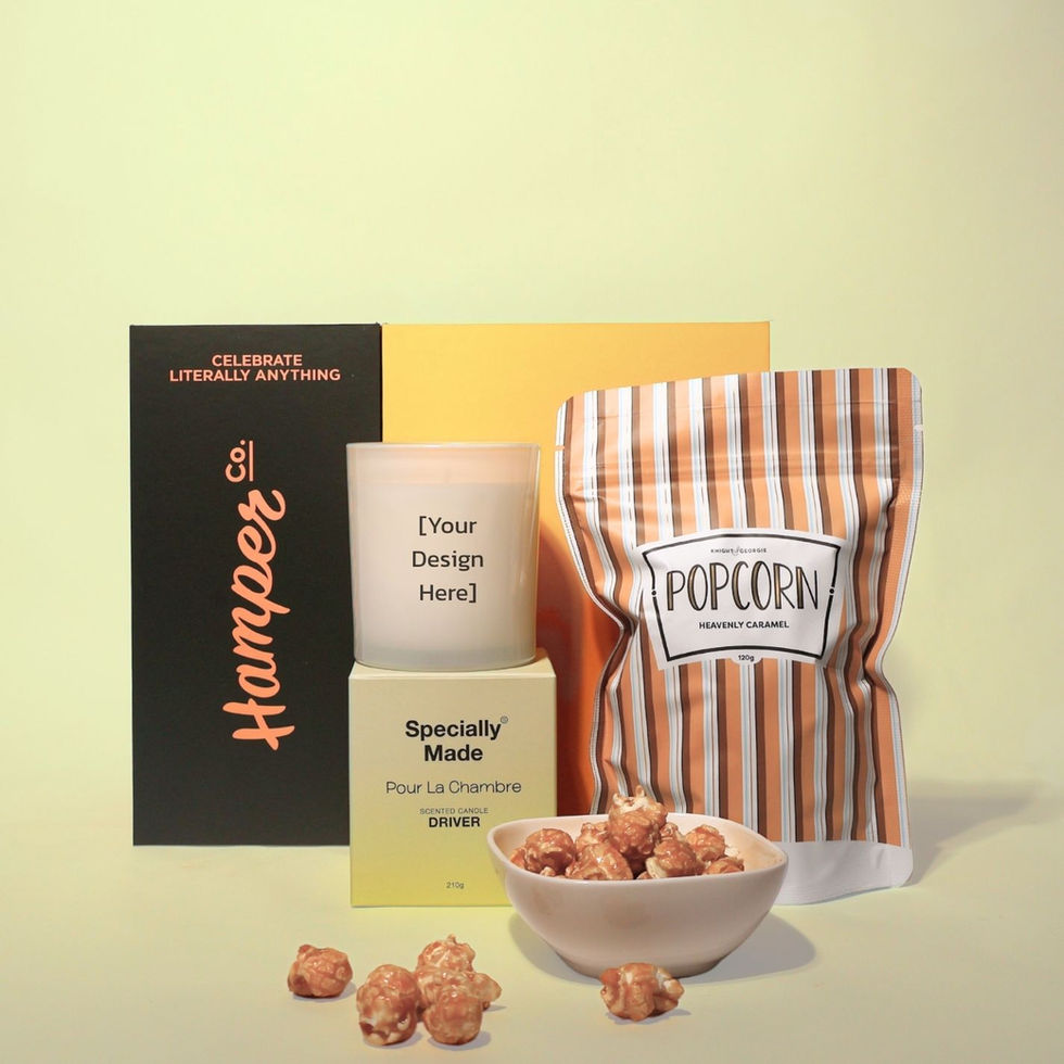Customisable Driver candle by specially made and Heavenly Caramel popcorn in front of a hamper box