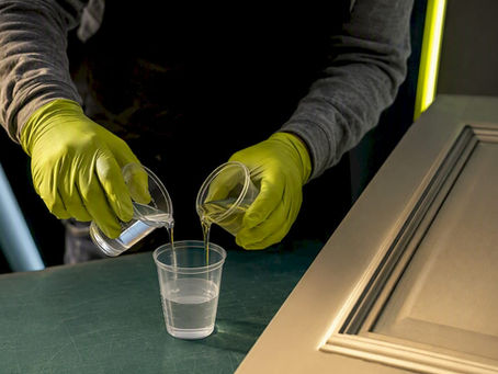 Catalyzed cabinet finish being prepared