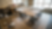 Eye-level view of MDF cabinet doors laid out for painting in a home workshop.