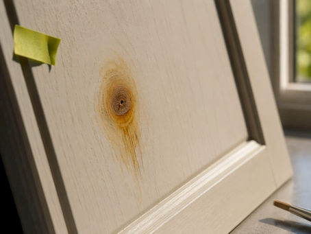 Resin stain bleeding through painted wood knot