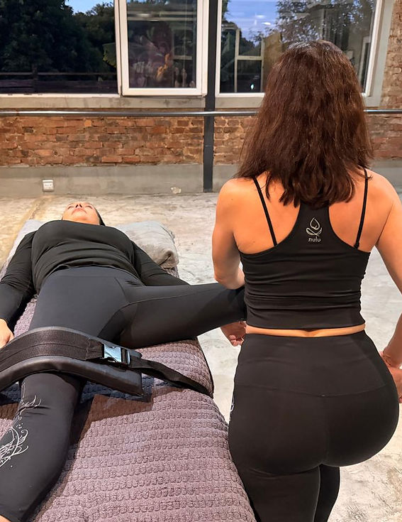 Assisted stretch therapy session in progress