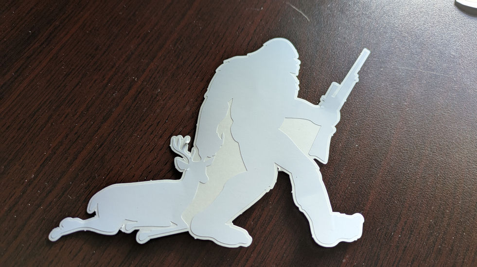 Vinyl Decal is a silhouette of Sasquatch Bigfoot Deer hunter vinyl decal Woodland Park printing high quality