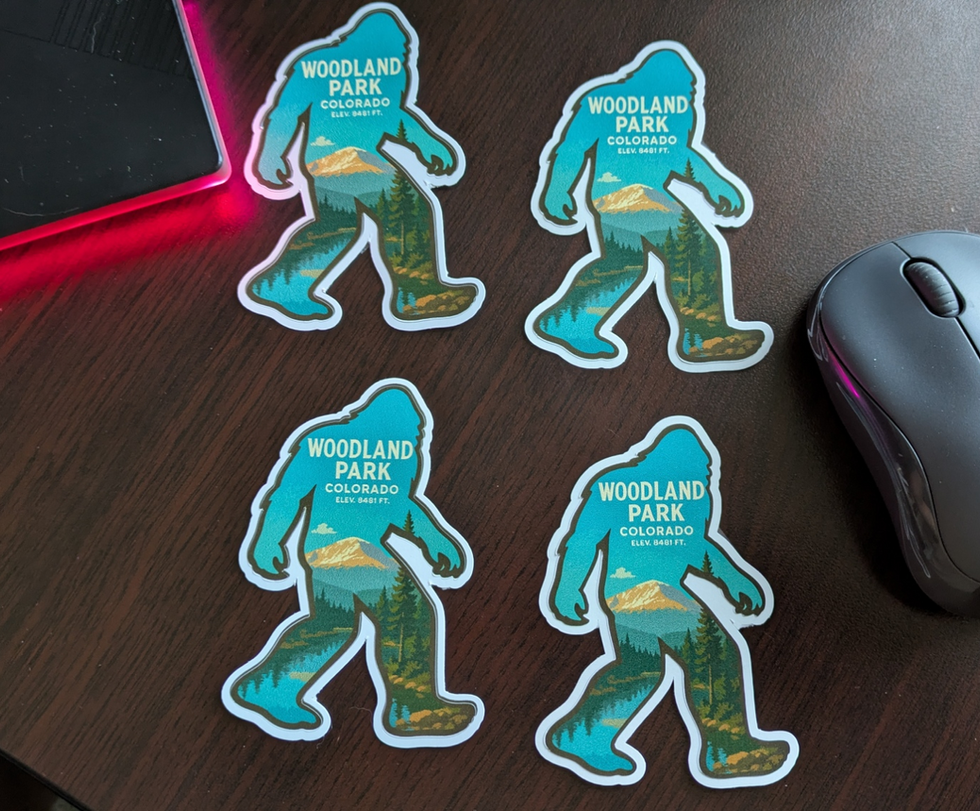Bigfoot Sasquatch silhouette water bottle sticker with "Woodland Park, Co. and the Elevation of 8,841 ft.