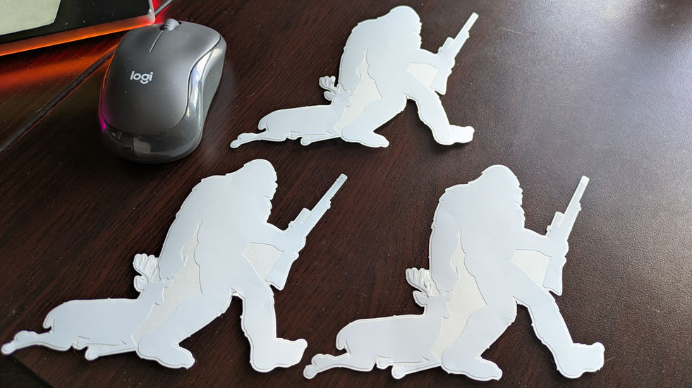 This Vinyl sticker is a silhouette of Sasquatch Bigfoot Deer hunter vinyl decal Woodland Park printing high quality