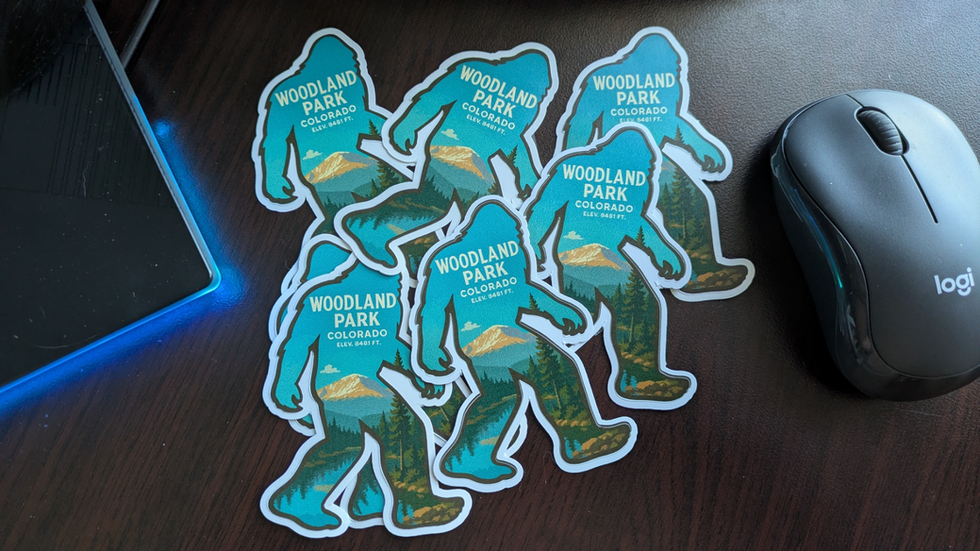 Bigfoot Sasquatch silhouette Bumper sticker with the elevation and city name of "Woodland Park, Co. and the Elevation of 8,84