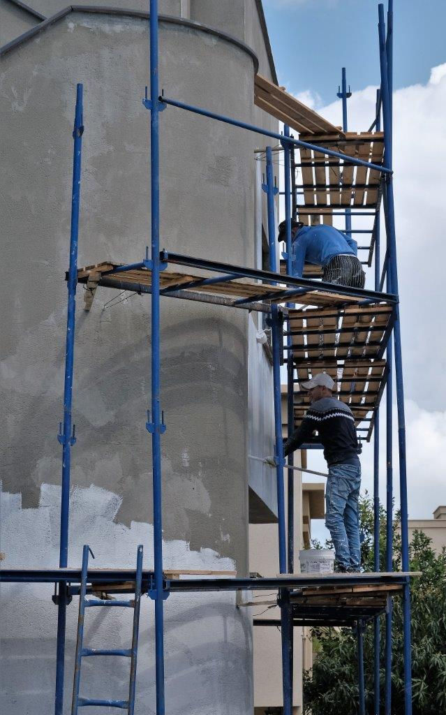 On the scaffolding.