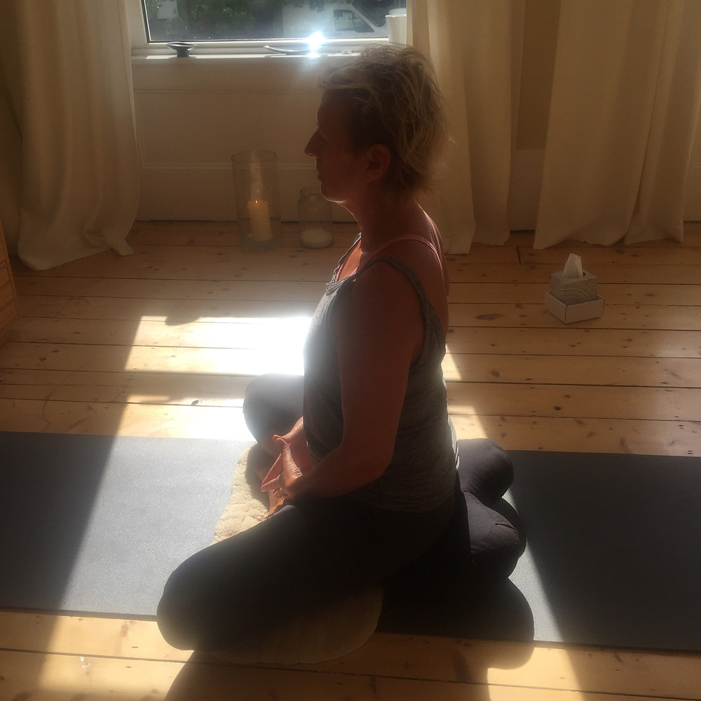 Iris Waller sitting in meditation