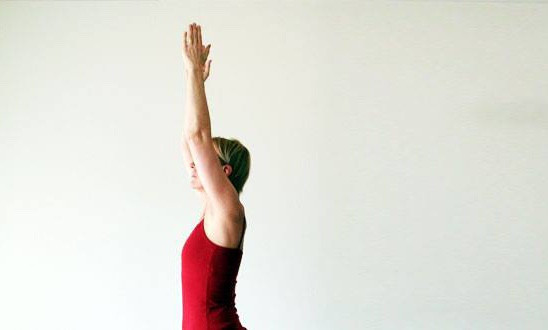 Arms up in yoga posture