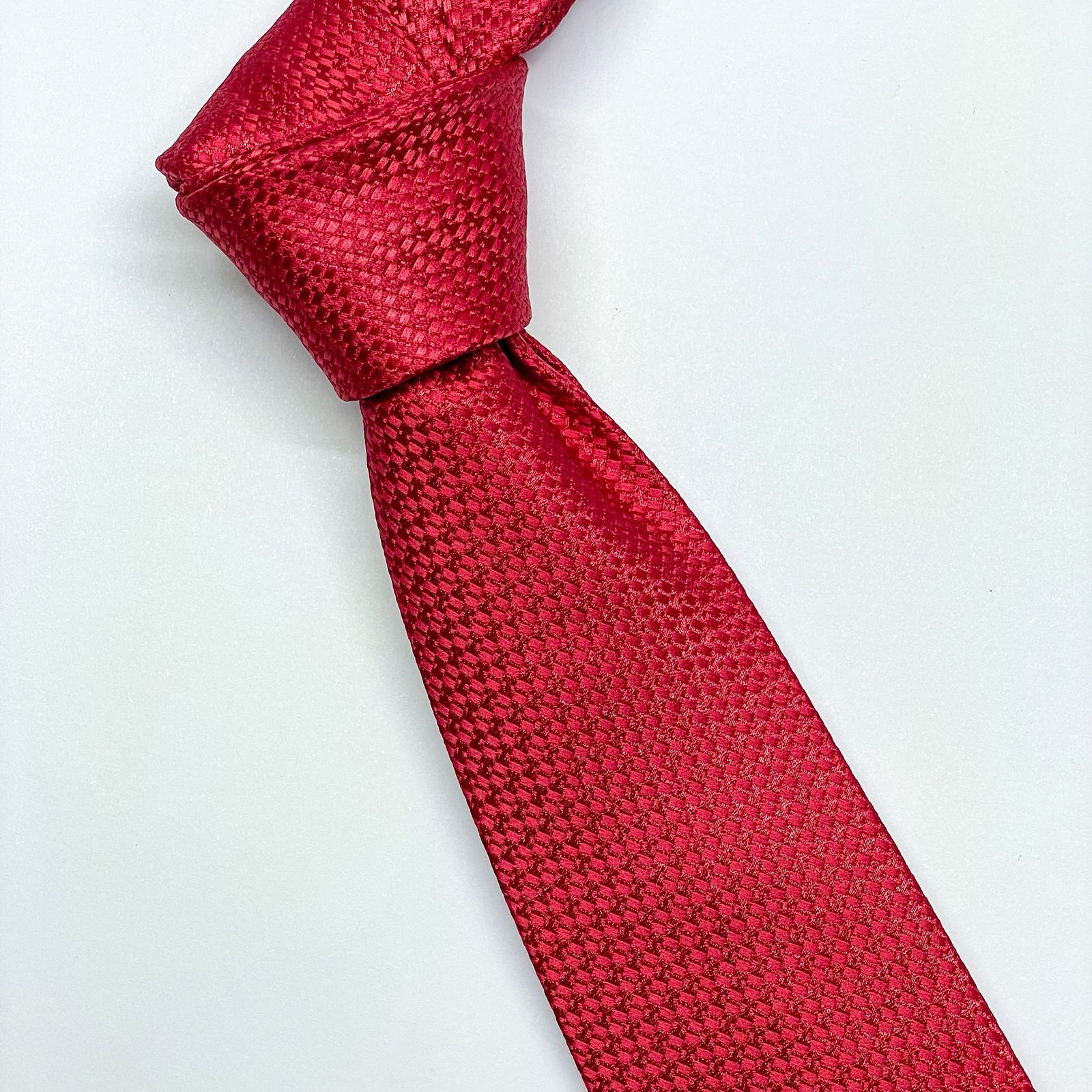 Corbata rooster con pequeño diseño en patron del mismo color