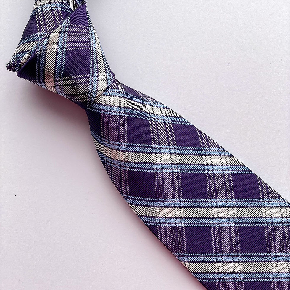 Una corbata de la colección HERITAGE de JoS.A.BANK con diseño escocés