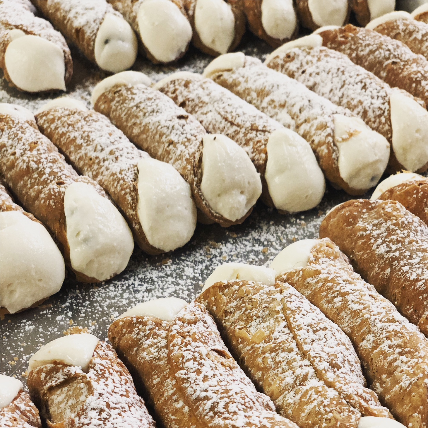 Ferrara Bakery: Classic cannoli filled with ricotta cream.
