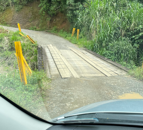 Home made wooden bridge joining two parts of the farm.