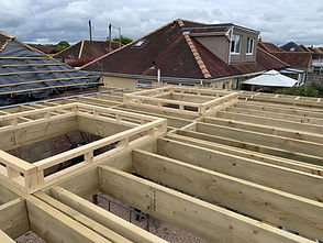 extension process photo of roof with sky lights.jpg