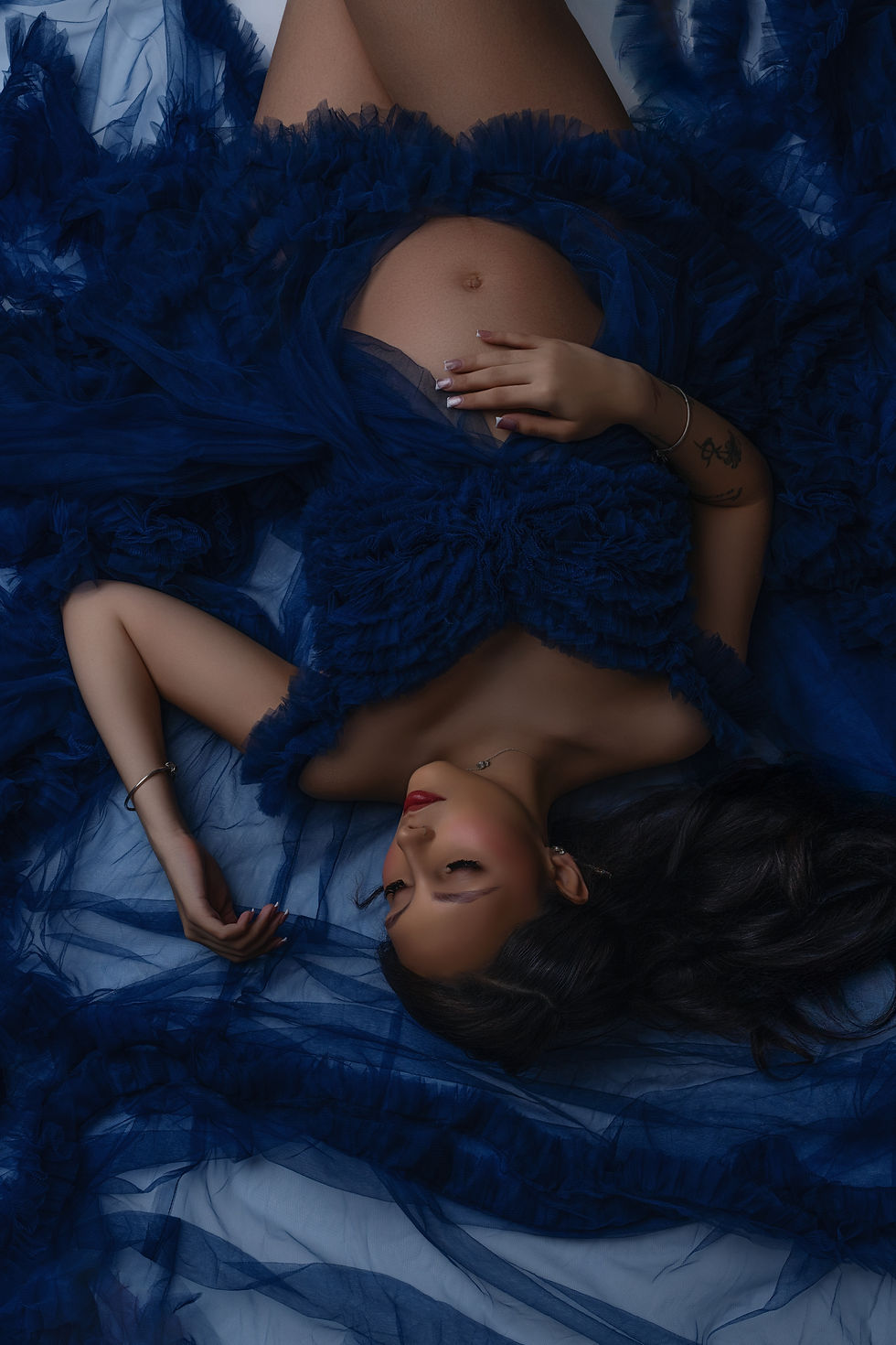 Maternity portrait by Photowjoa in Central Florida showing a refined maternity photography experience