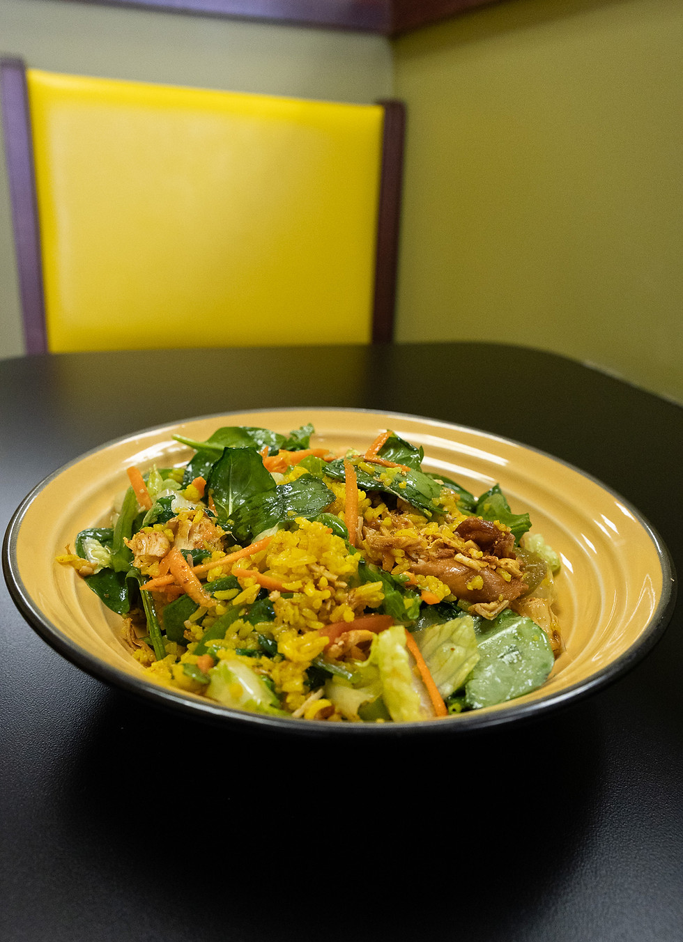 Mediterranean salad with fresh greens, vegetables, and healthy toppings