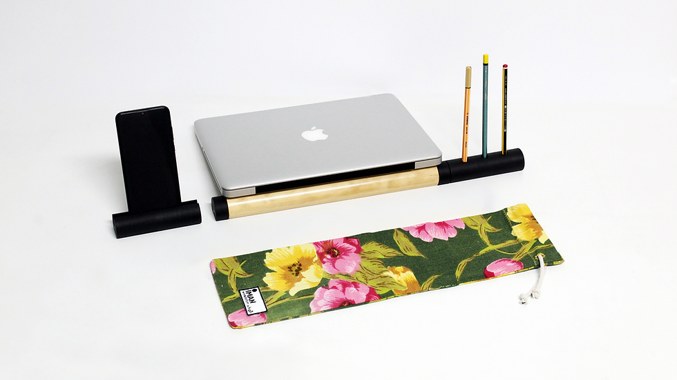 IMAN flowers is a worksation with a holder for laptop, mobile phone and pens, a functional and adjustable set.