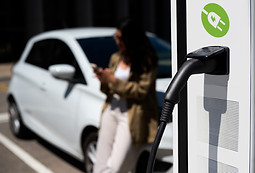 side-view-blurry-woman-waiting-near-car.jpg