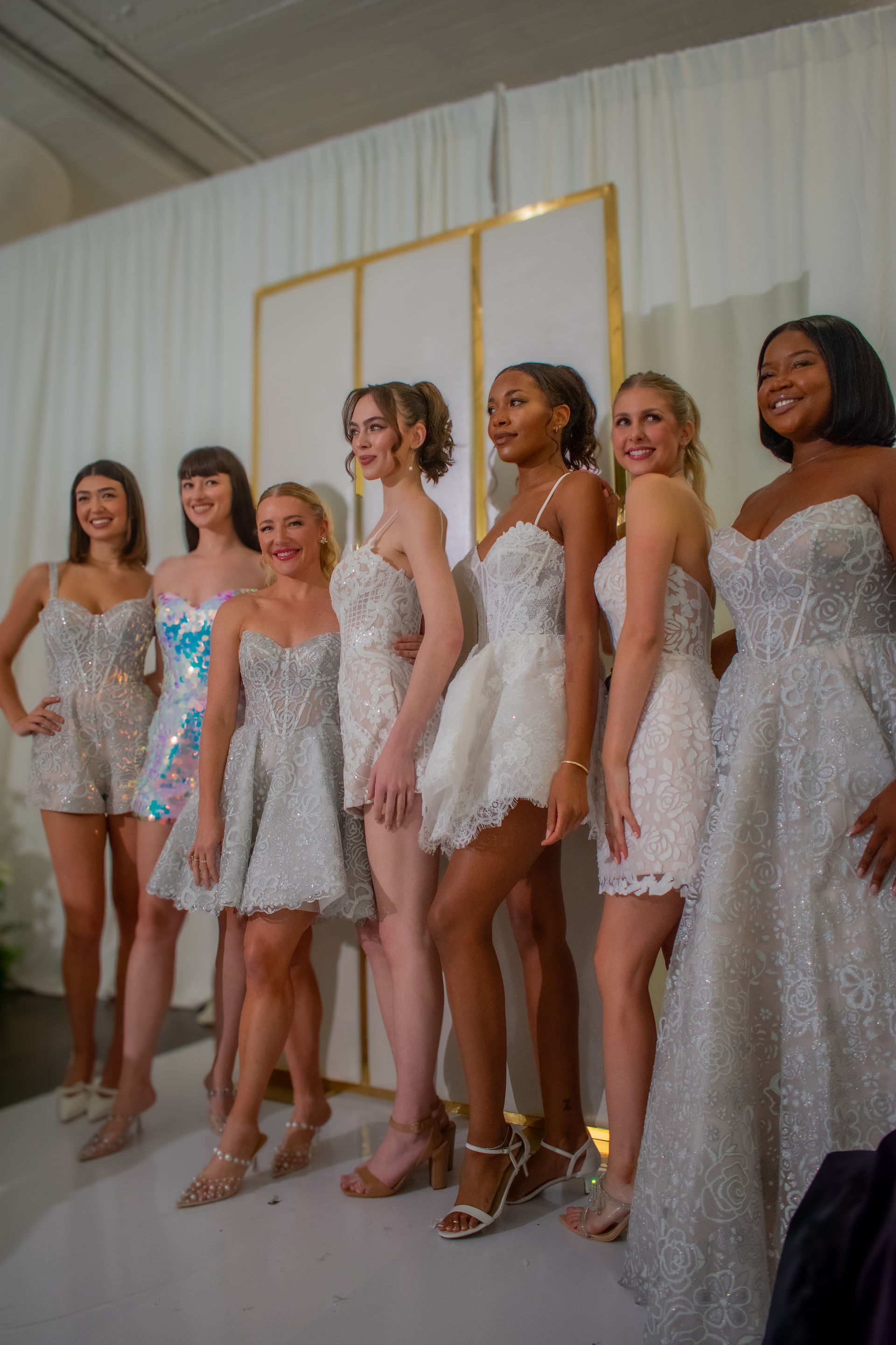 Bride walking down runway in Hayley Paige weddingg own at NYBFW Fall 2025 by lucid ladybug photography