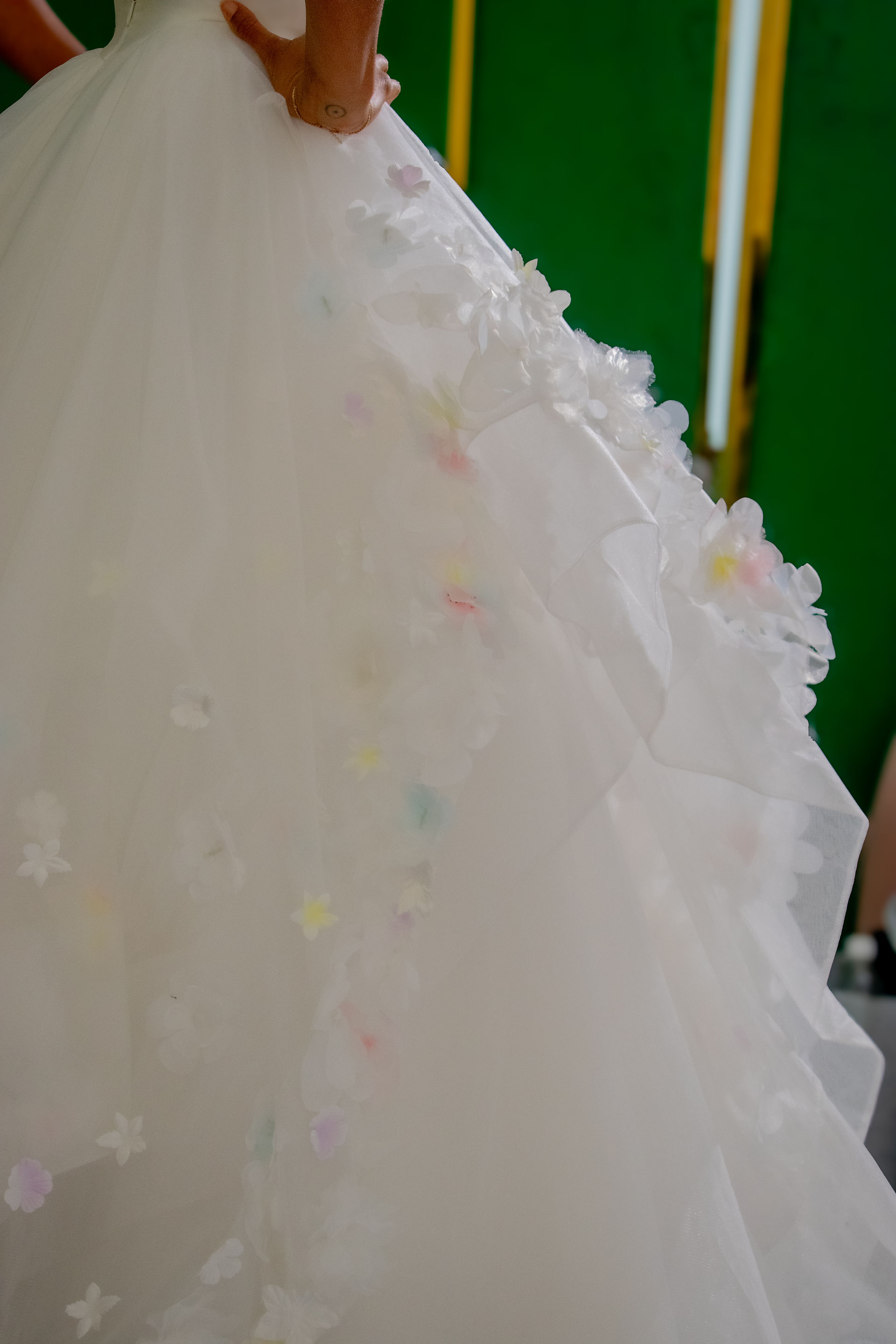 Close up on gown featuring butterflies Bride walking down runway in Hayley Paige weddingg own at NYBFW Fall 2025 by lucid ladybug photography