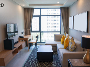 Cozy room with sofa, TV, and large windows