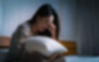 oman experiencing emotional distress linked to past relationship trauma.