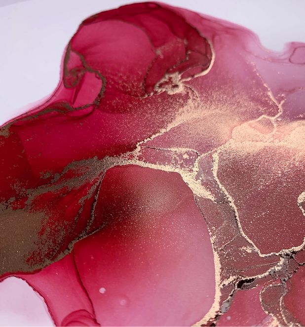 red alcohol ink painting close up