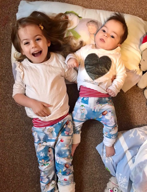 How sewing helped sam. Both her daughters wearing handmade clothing