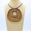 Miniatura: Collar con colgante textil artesanal, amarillo, negro.