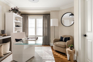 Resonance Interiors featuring Modern Organic Serene design with limewash walls, modern glass desk, sleek upholstered crisp desk chair, custom drapery and window coverings, linen / silk rug 